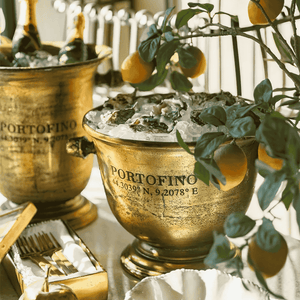 Portofino Gold Champagne Bucket styled on a French-inspired dining table