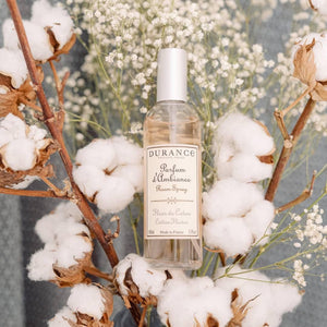 Durance Cotton Flower Room Spray laying on cotton