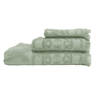 Set of three green Ubud French towels stacked