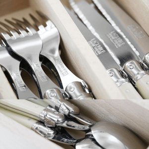Close up of Cutlery handle detail from Laguiole Debutant cutlery set in ivory – authentic French dining set – Malmaison