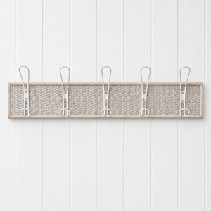 French country woven coat rack with 5 hooks on white wall