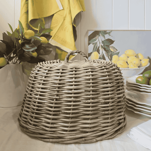 Provence Rattan Cloche displayed on French Country Table Setting
