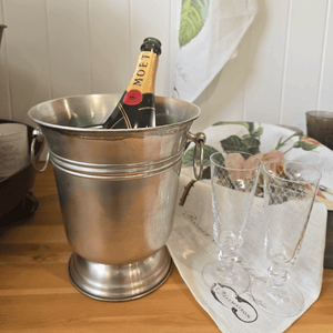 Warehouse Sale Pewter Champagne Ice bucket seconds with minor surface markings visible. Crystal Champagne Flutes.