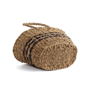 Close-up of base of French Riviera basket - natural seagrass weave and striped detailing on basket