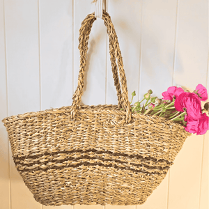 Hanging Handcrafted seagrass tote bag with handles – neutral background