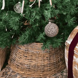 Close-up of handwoven grapevine detailing on Christmas tree skirt