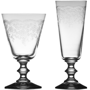 Close up of crystal etching on champagne and wine glass