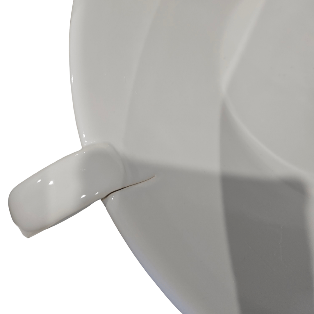 Close-up of a white ceramic cup on a white background
