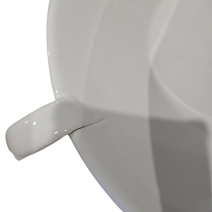 Close-up of a white ceramic cup on a white background