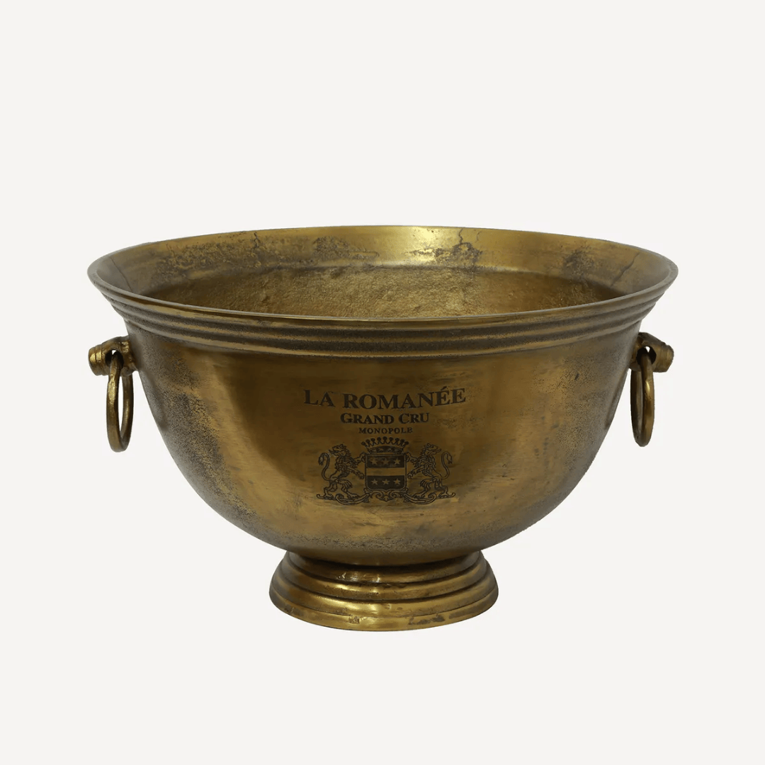 Bronze bowl with 'La Romanée Grand Cru' branding on a white background