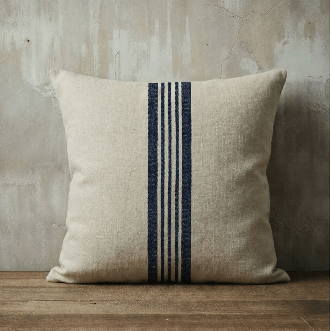 Aubrac Square French Grain Stripe Cushion styled on french chair - Blue denim Stripe