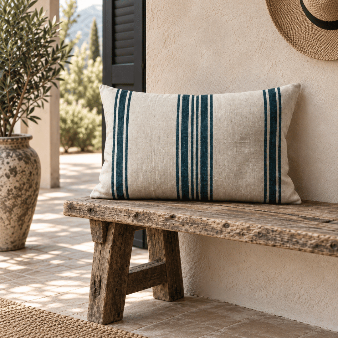 Avignon Rectangle French Grain Stripe Cushion styled on timber bench - Blue denim Stripe