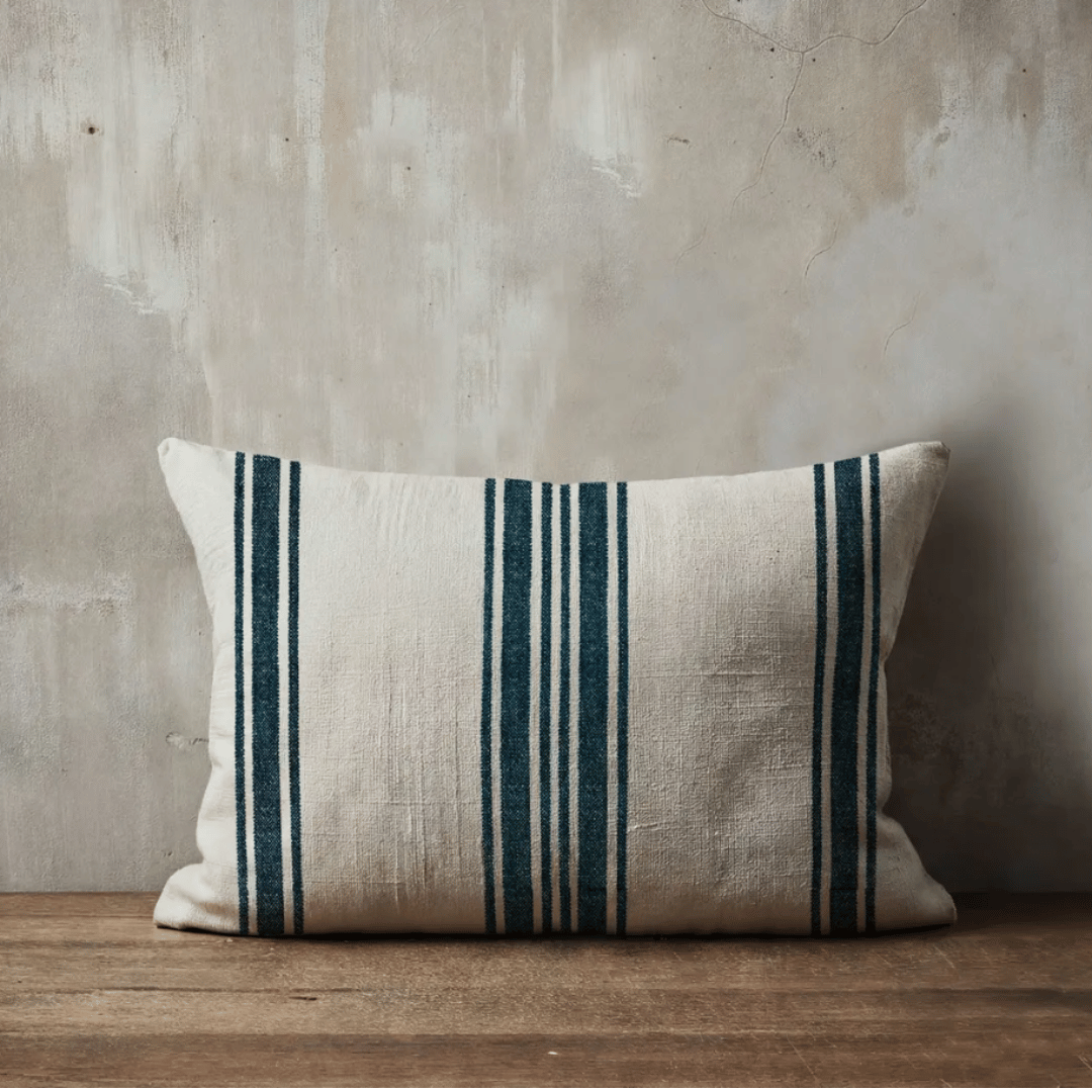 Avignon Rectangle French Grain Stripe Cushion styled on timber bench - Blue denim Stripe