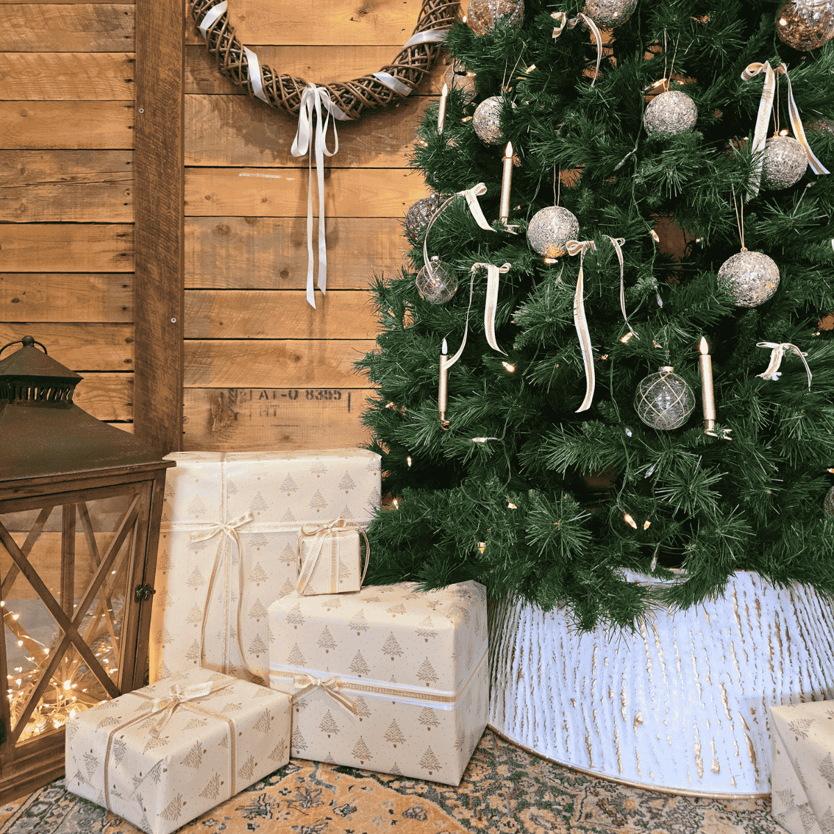 Étoile de Lune Christmas Tree Skirt in white and gold – under Christmas tree with gifts