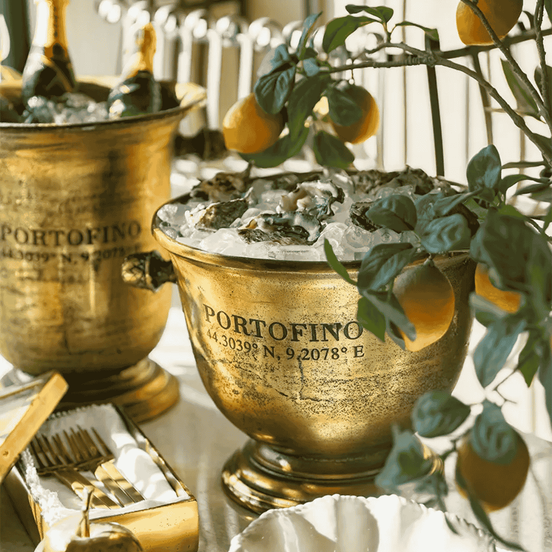 Portofino Gold Champagne Bucket styled on a French-inspired dining table