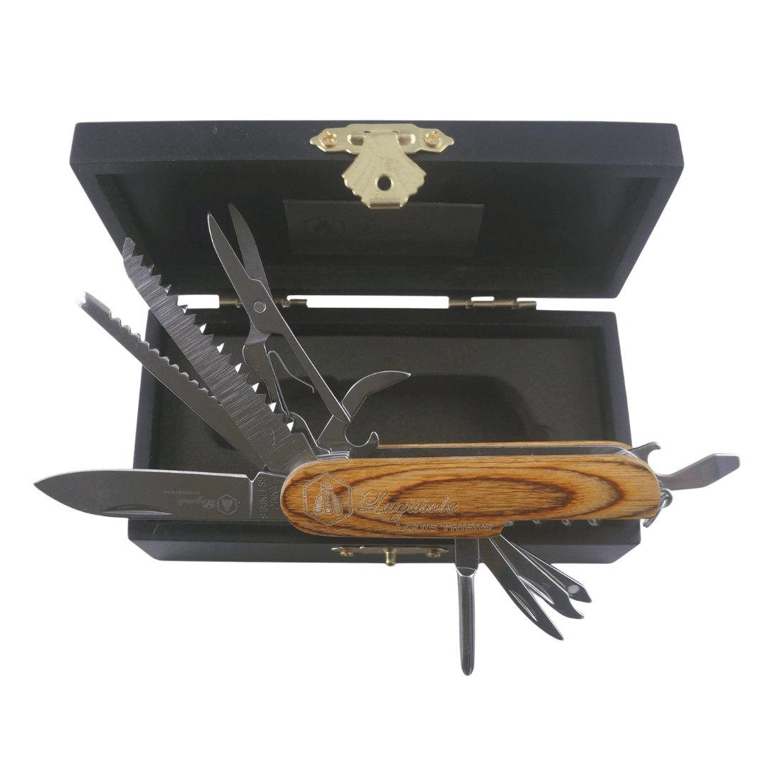 Red wood Laguiole pocket knife resting in black timber gift box