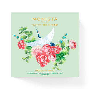 Monista tea gift set packaging with floral design and text on a light green background