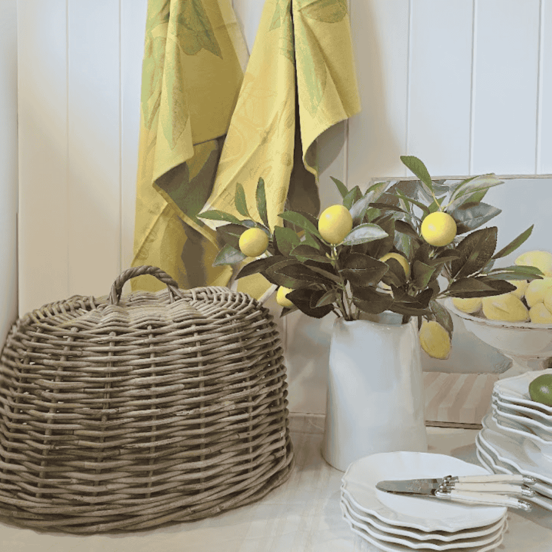 Provence Rattan Cloche displayed on French Country Table Setting