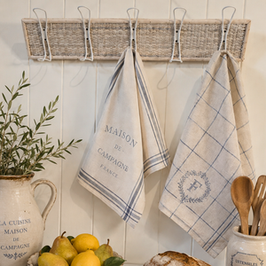French country woven coat rack in the kitchen