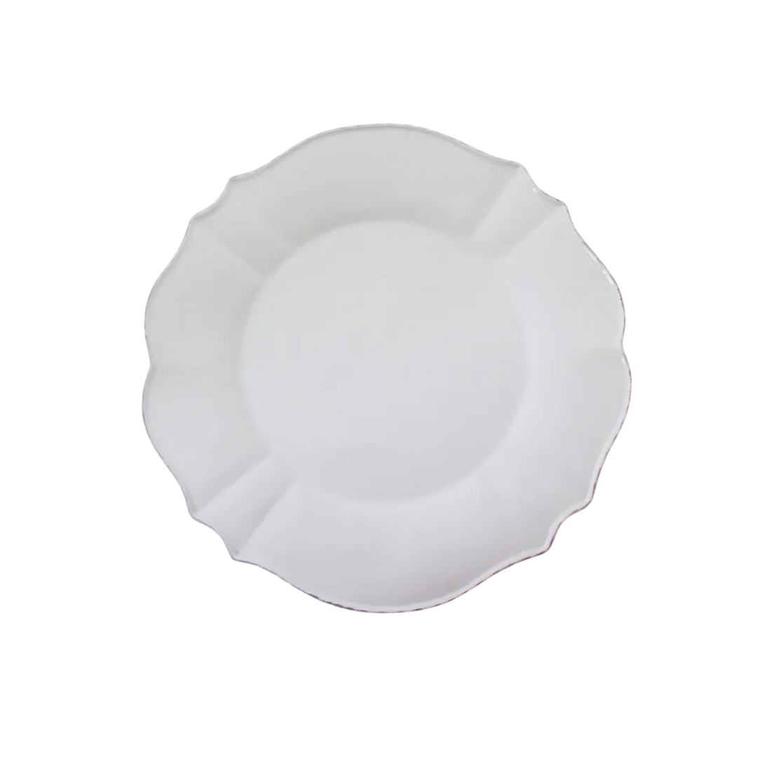 French Country Vienna White Stoneware Dinnerset with lemons and limes on a table