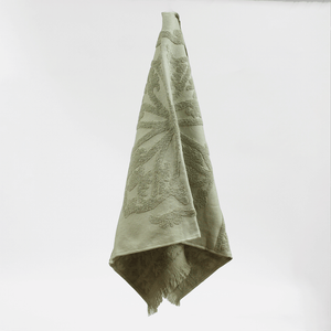 Close-up of French Green towel with botanical weave texture – Malmaison
