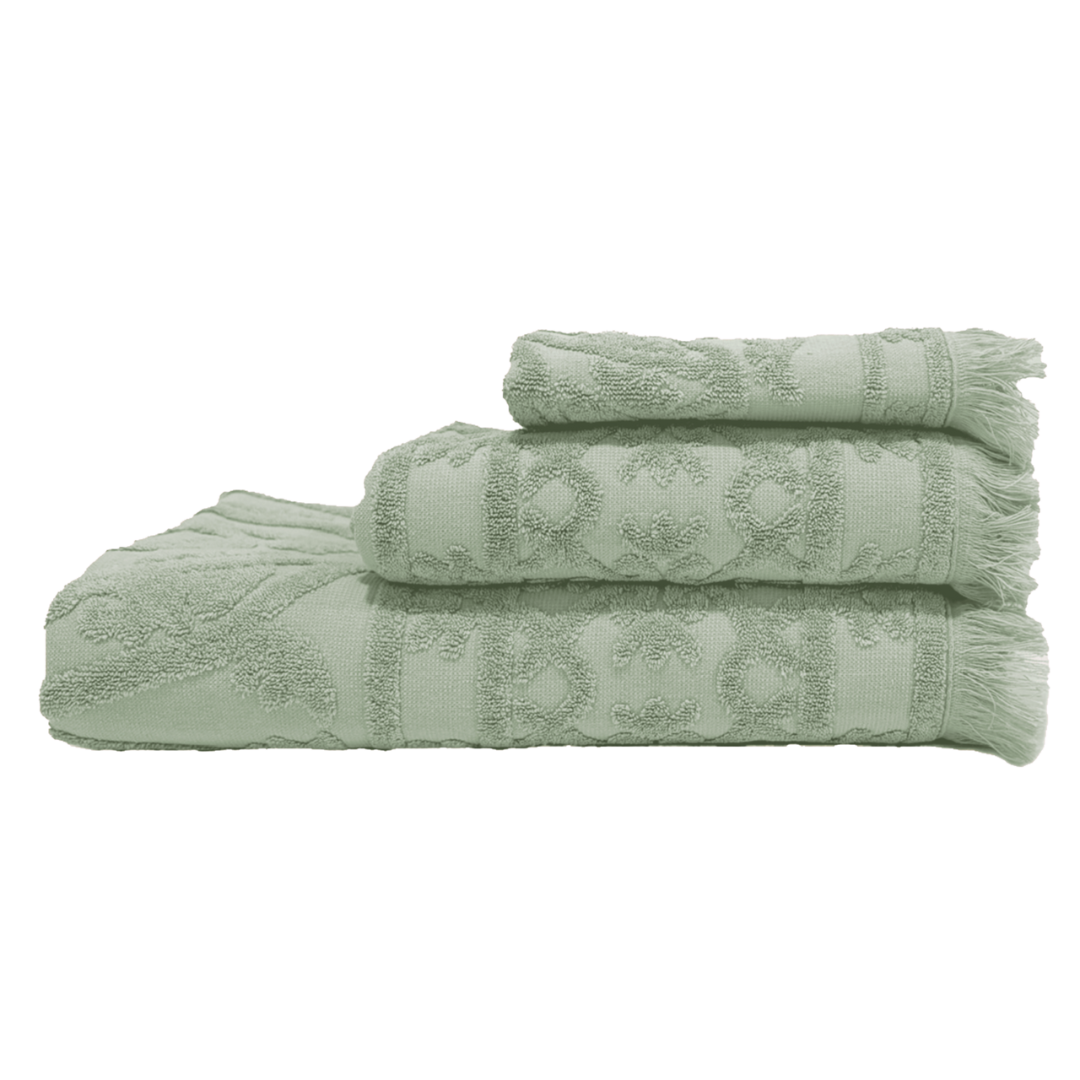 Set of three green Ubud French towels stacked