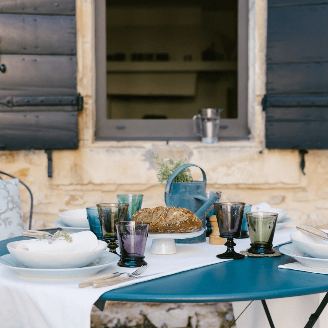 Outdoor Table Setting with French Bee Pasta Bowls and Dinner Plates with Matching French Coloured Glassware