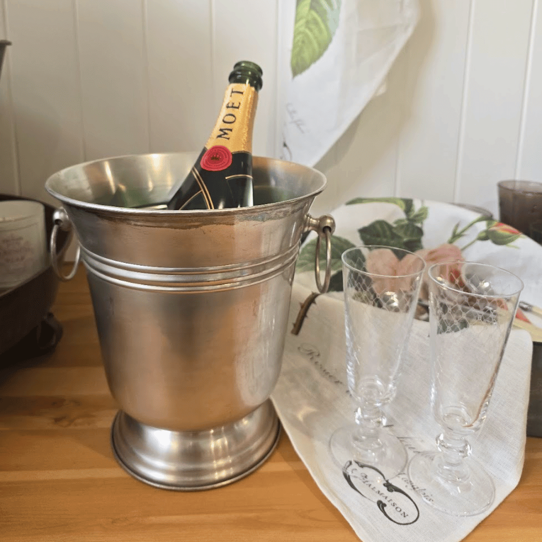 Warehouse Sale Pewter Champagne Ice bucket seconds with minor surface markings visible. Crystal Champagne Flutes.