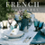 Table setting with coloured glasses on a white tablecloth, featuring 'French Homewares' text.