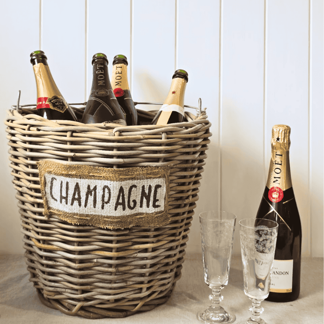 Wicker ice bucket with crytal champagne flutes