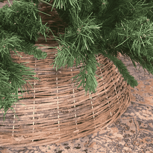 Natural grapevine Christmas  tree skirt styled on patterned rug – Malmaison Noël de Maison