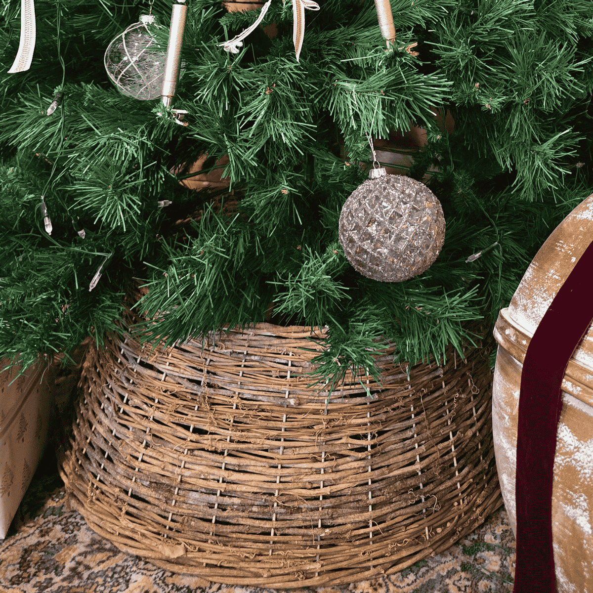 Close-up of handwoven grapevine detailing on Christmas tree skirt